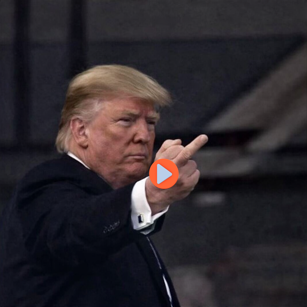 Donald tRump raising his middle finger